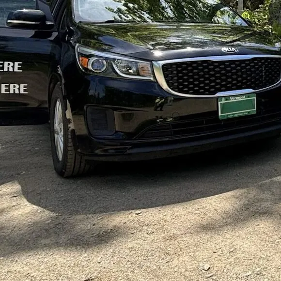 Here to There vehicle parked in the woods